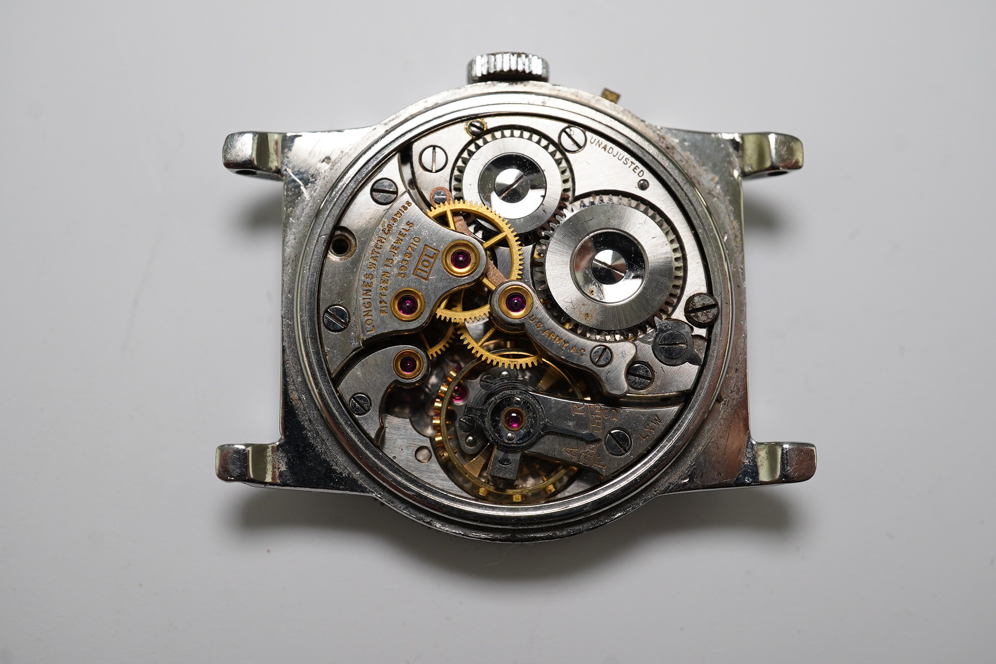 A gentleman's late 1930's steel Longines Weems U.S Patent military pilot's manual wind wrist watch, with Arabic dial, movement c.10L, case diameter 28mm, lacking one crown, no strap. Condition - poor